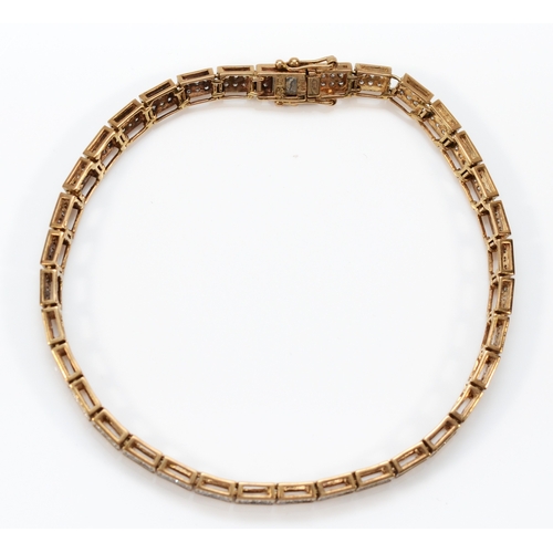 130 - A 9ct yellow gold and diamond set panel link bracelet, each with six single cut stones, stated weigh... 