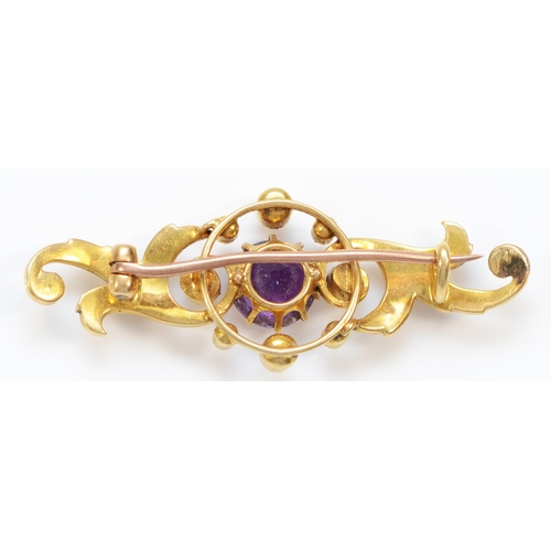 148 - An unmarked Victorian gold amethyst and half pearl scroll brooch, tests 9ct, 41mm, 4.1gm