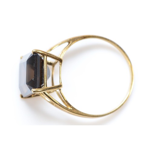 153 - A 9ct gold and smokey quartz dress ring, 11 x 10mm, P 1/2, 2.2gm