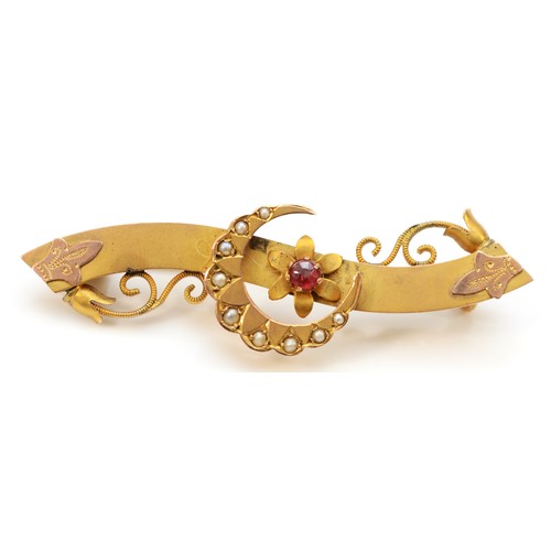 155 - A Victorian 9ct gold red paste and half pearl crescent and scroll brooch, Chester 1898, 45mm, metal ... 