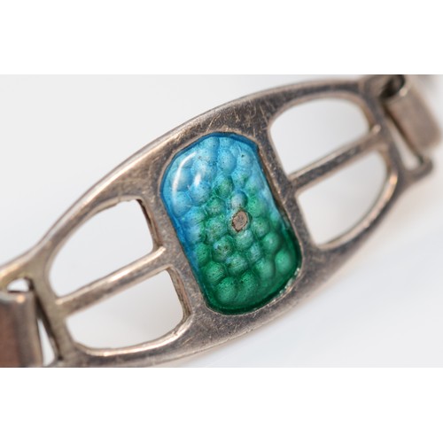 160 - An Arts & Crafts silver and enamel bracelet, by James Fenton, Birmingham 1909, composed of five open... 