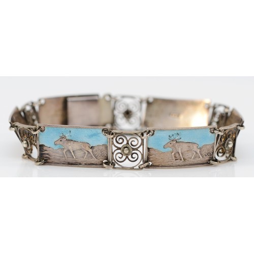 169 - A Swedish 830 standard silver and enamel panel link bracelet, composed of six panels with reindeer, ... 