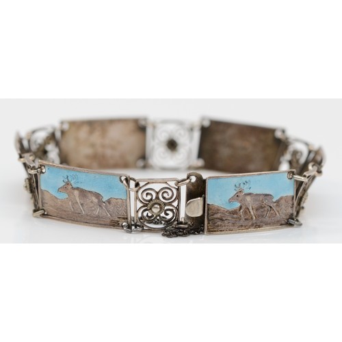 169 - A Swedish 830 standard silver and enamel panel link bracelet, composed of six panels with reindeer, ... 