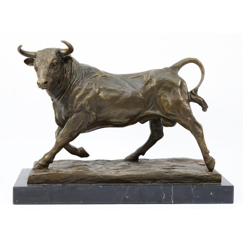 185 - A large bronze model of a Bull, signed 'Milo' later casting with foundry mark, upon a rectangular po... 