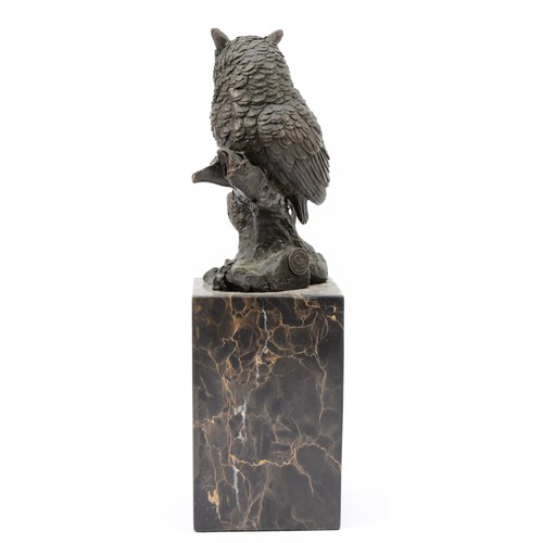 186 - A  bronze model of an owl, signed 'Milo' later casting with foundry mark, upon a square polished mar... 