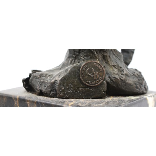 186 - A  bronze model of an owl, signed 'Milo' later casting with foundry mark, upon a square polished mar... 