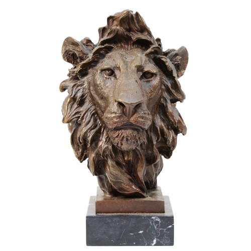 187 - A large bronze sculptured mask of a lion, signed 'Barye', later casting, upon a square polished marb... 