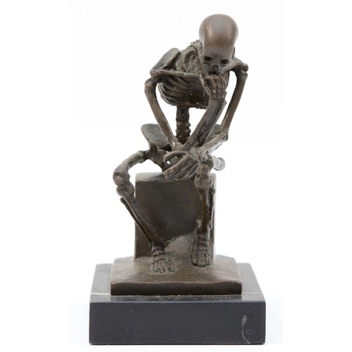 189 - A bronze figural model of a seated skeleton, signed 'Milo' later casting, with foundry stamp, upon a... 