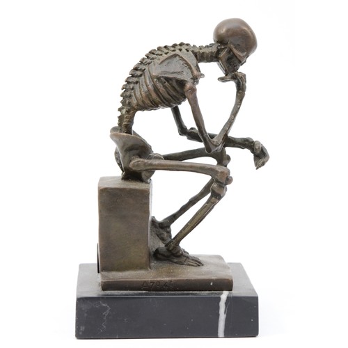 189 - A bronze figural model of a seated skeleton, signed 'Milo' later casting, with foundry stamp, upon a... 