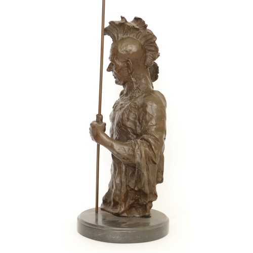 191 - A large bronze bust of a native American Indian Chief holding an arrow, signed 'Nick', raised on a c... 