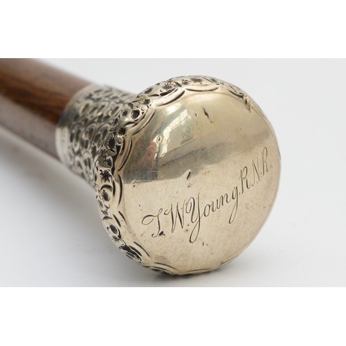 196 - Early 20th century walking cane, with planished silver domed pommel, engraved 'T.W.Young.R.N.R' hall... 