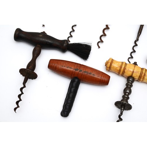 199 - A collection of early 20th century and later corkscrews/bottle openers, including T-handle corkscrew... 