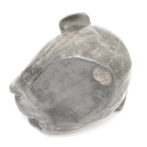 206 - An early 20th century novelty pewter match striker, in the form of a bulldog, 5.5cm tall.