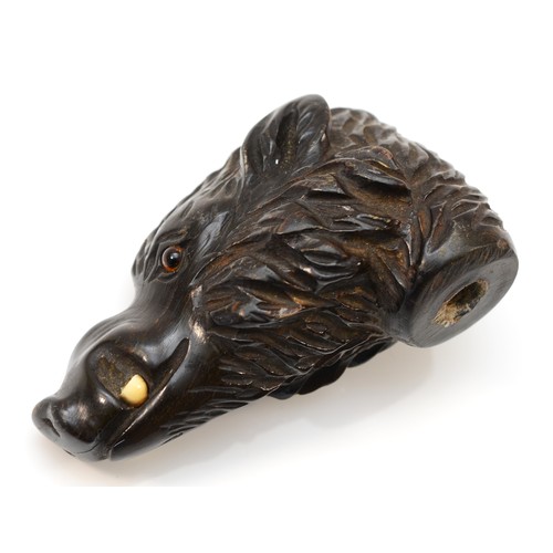 210 - A 19th century carved horn cane handle, in the form of a wild boar, with glass eyseand bone tusks, 7... 