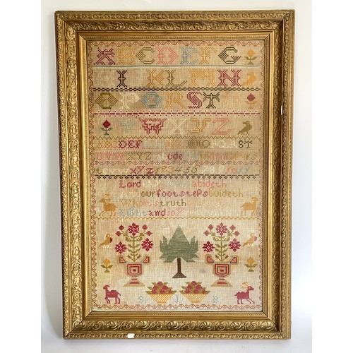 212 - A Victorian sampler, embroidered with the alphabet, a pray, and other motifs, initialled S.J.B., 66 ... 