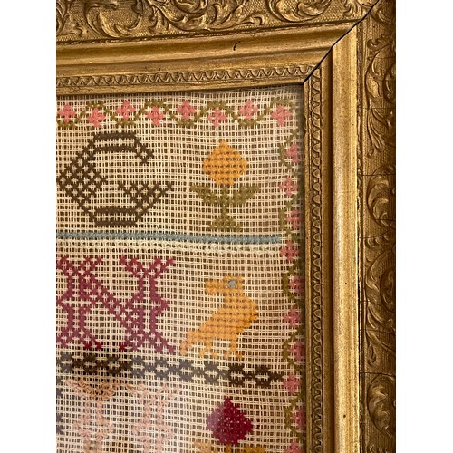 212 - A Victorian sampler, embroidered with the alphabet, a pray, and other motifs, initialled S.J.B., 66 ... 