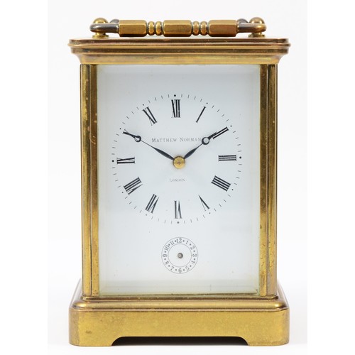 220 - A 20th century Matthew Norman brass case carriage clock, having enamelled white dial with Roman nume... 