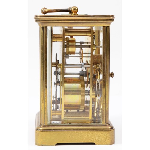 220 - A 20th century Matthew Norman brass case carriage clock, having enamelled white dial with Roman nume... 