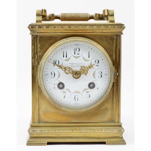 243 - An early 20th century French brass case carriage/mantel clock, of square form having painted porcela... 