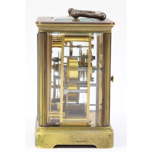 223 - An early 20th century gilt brass French carriage clock, having platform escapement and alarm, the 8 ... 