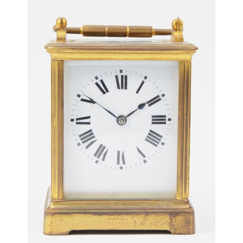 224 - An early 20th century French brass case carriage clock, having white enamelled dial with Roman numer... 