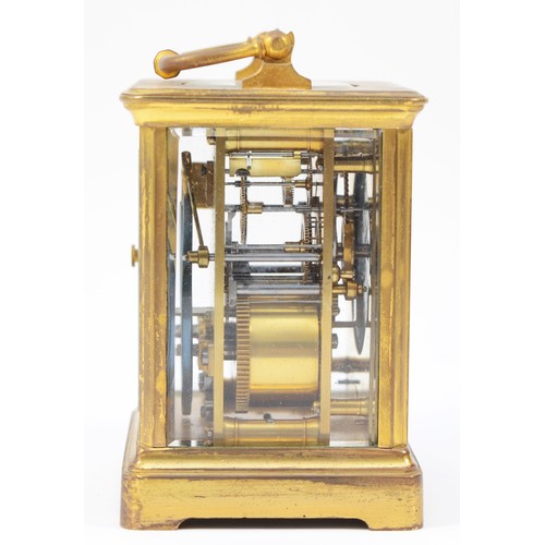 224 - An early 20th century French brass case carriage clock, having white enamelled dial with Roman numer... 