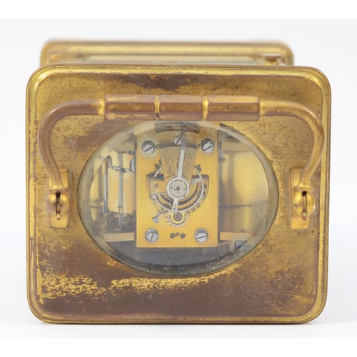 224 - An early 20th century French brass case carriage clock, having white enamelled dial with Roman numer... 