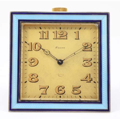 245 - Asprey of London; Art Deco 8-day gilt-metal travelling clock, of square form having gilded dial with... 