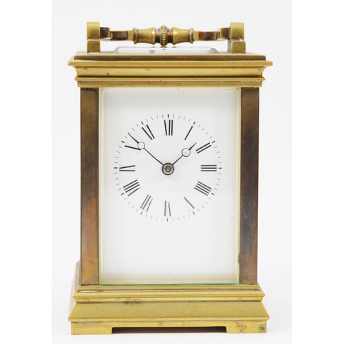 228 - An early 20th century brass case 8 day carriage clock, the movement striking on gong, raised on a br... 