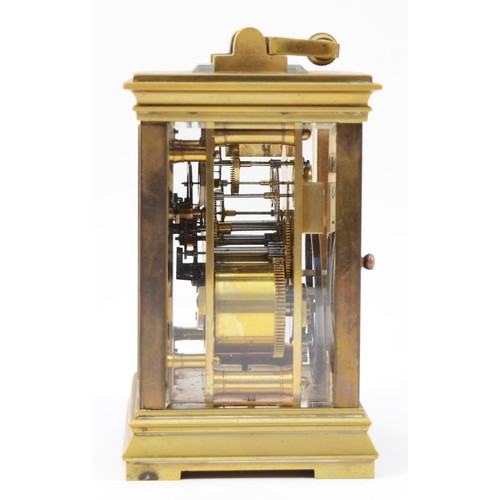 228 - An early 20th century brass case 8 day carriage clock, the movement striking on gong, raised on a br... 