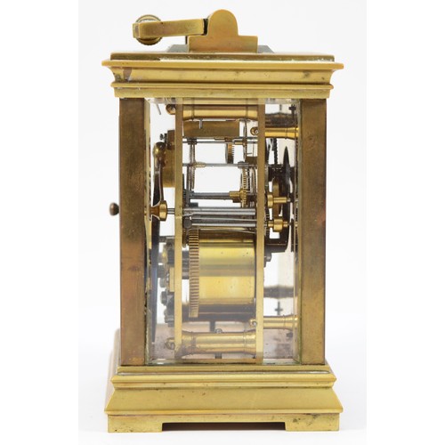 228 - An early 20th century brass case 8 day carriage clock, the movement striking on gong, raised on a br... 