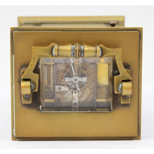 228 - An early 20th century brass case 8 day carriage clock, the movement striking on gong, raised on a br... 