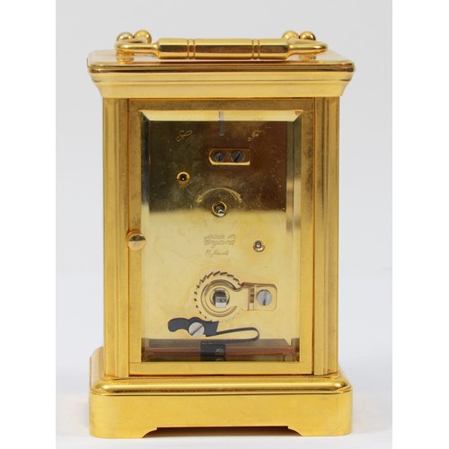 229 - A late 20th century English brass case carriage clock 'The Wallace Collection' having enamelled deco... 