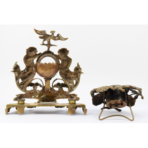 251 - A late 19th Century brass desk top pocket watch stand, comprising of laurel wreath with scrolls and ... 