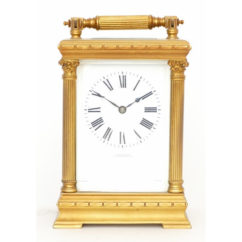 231 - An early 20th century large gilt brass carriage clock, the 8 day movement stamped 'Made In France' s... 