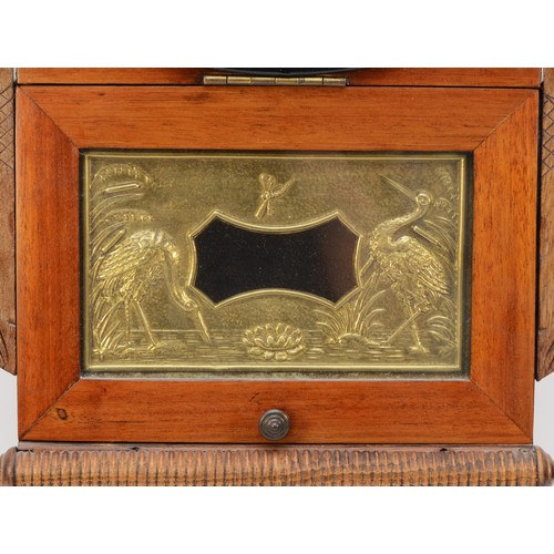 258 - An American drop dial wall clock c1910, with a mahogany and ebonised dial surround and case, box wit... 