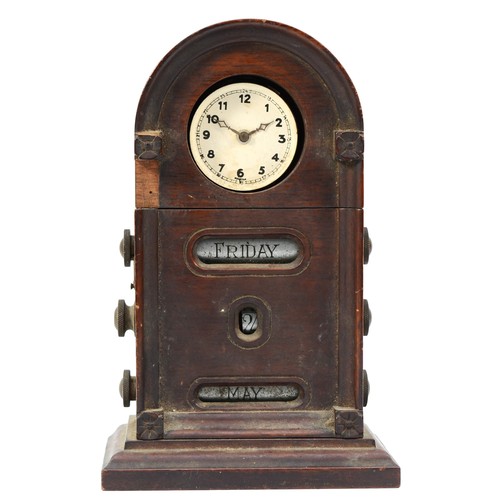 256 - A late 19th century mahogany cased desk calendar, incorporating a clock (in need of repair) 23cm tal... 