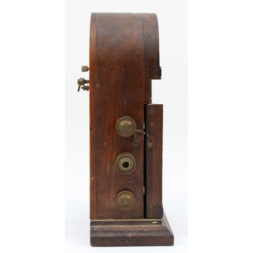 256 - A late 19th century mahogany cased desk calendar, incorporating a clock (in need of repair) 23cm tal... 