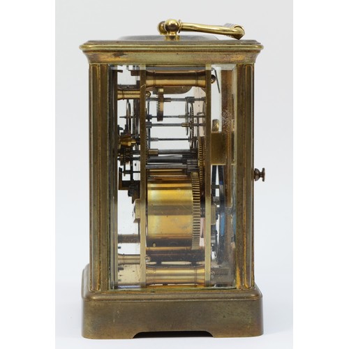 234 - An early 20th century brass case carriage clock, the enamelled dial with Roman and Arabic numerals, ... 