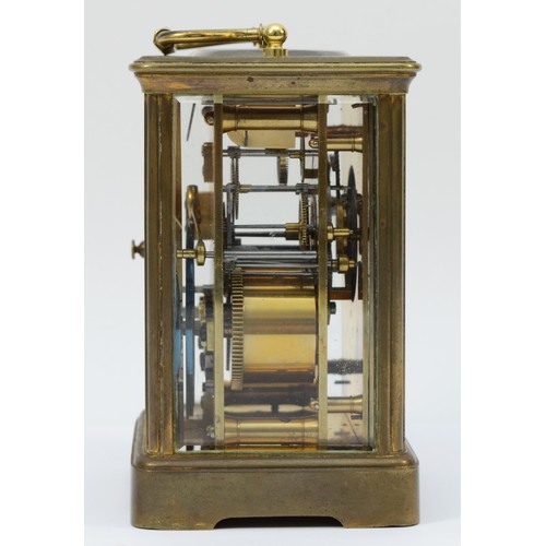 234 - An early 20th century brass case carriage clock, the enamelled dial with Roman and Arabic numerals, ... 