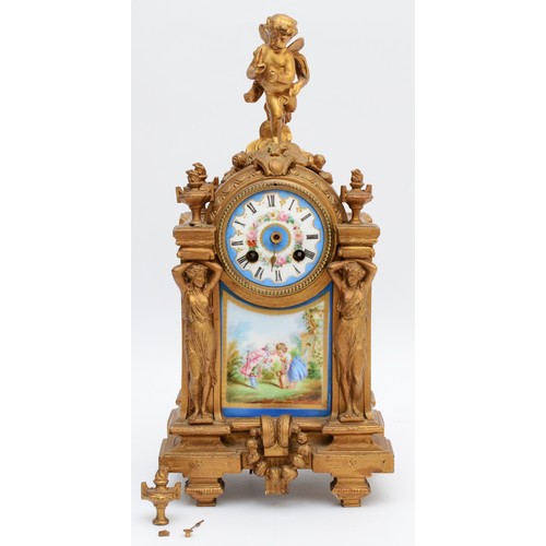 262 - A French gilt ormolu mantel clock, late 19th Century, surmounted with cherub, over two figural colum... 