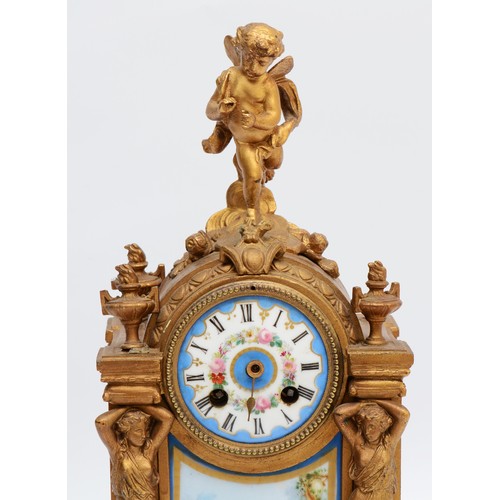 262 - A French gilt ormolu mantel clock, late 19th Century, surmounted with cherub, over two figural colum... 