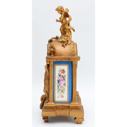 262 - A French gilt ormolu mantel clock, late 19th Century, surmounted with cherub, over two figural colum... 