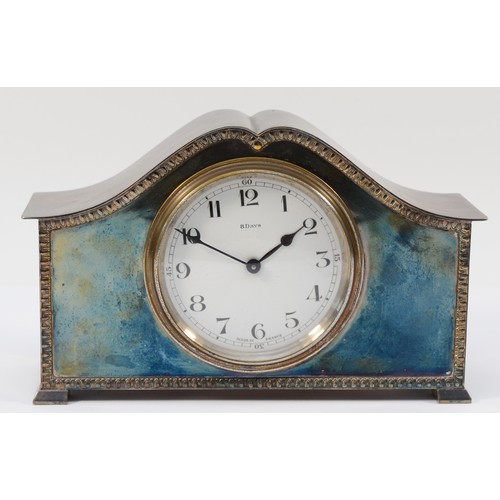 249 - An early 20th century electroplate mantel clock, with gadrooned border, the white enamel dial with A... 