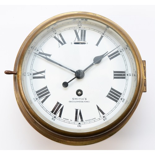 254 - A 20th century ships brass bulkhead clock, having 8-day movement with enamelled dial, roman and arab... 