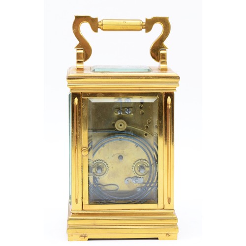 240 - An English 8 day brass carriage clock, circa early 20th century, the movement striking on a coiled g... 