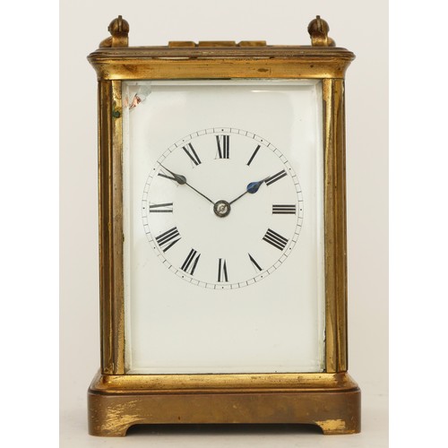 241 - A 20th century brass carriage clock, the enamelled dial with Roman and Arabic numerals, having an 8 ... 