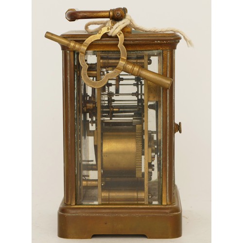 242 - A 20th century gilt brass 8 day carriage, the enamelled white dial with Roman numerals, movement str... 