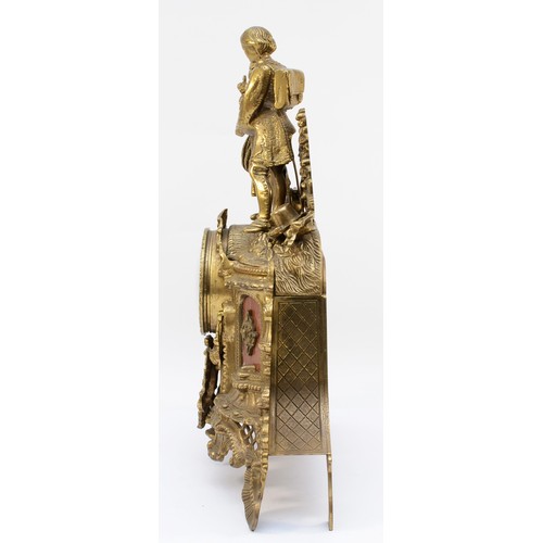 265 - A 20th century Italian Imperial style gilt cast brass mantel clock, two lovers above scrolling decor... 