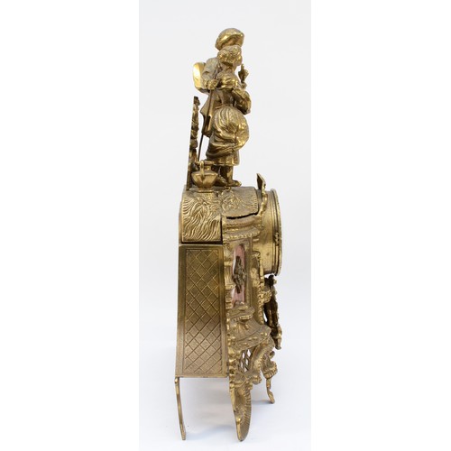 265 - A 20th century Italian Imperial style gilt cast brass mantel clock, two lovers above scrolling decor... 